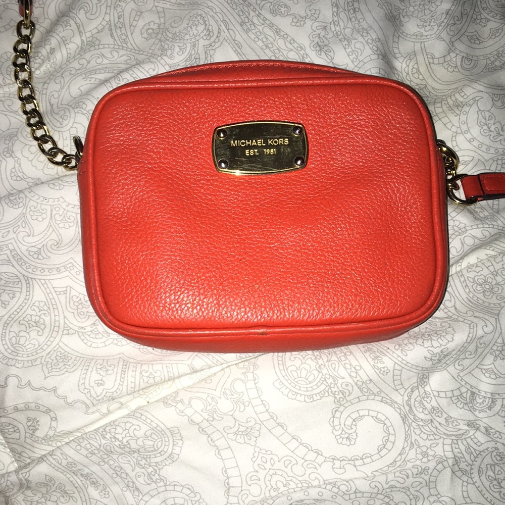 Red Michael Kors crossbody bag